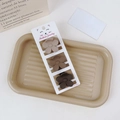 Three-piece set of matte flower hair claws in brown and beige tones on a textured tray - 3Pcs Claw Clip Set-Flower Shape / Coffee Brown Series