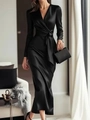 Close-up of elegant black satin dress fabric texture with waist tie and V-neck detail - S / Dresses / Black