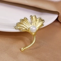 Elegant gold ginkgo leaf brooch with shimmering pearl and pavé rhinestone accents - Golden Ginkgo Leaf