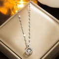 Elegant silver-colored swan pendant necklace with sparkling stones on a gift box - 8951 Steel-colored Graceful Swan