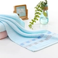Light blue and pink cotton towels with checkered borders on a clean bathroom counter - Weak Twist Plaid Blue / 34*74cm