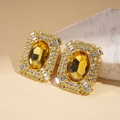Orecchini stile vintage con grande citrino ovale e alone di cristalli geometrici - Oro