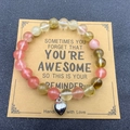 Pink zebra stone bead bracelet with silver heart charm on reminder greeting card - Pink Yellow Green Stone With Card