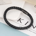 Detailed view of black braided leather bracelet with a matte black magnetic clasp - Black Leather Black Buckle