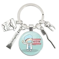 Creative silver metal keychain featuring miniature dental charms with a cartoon doctor pendant - Cartoon Dentist Holding Dentures