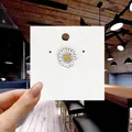 Cute white daisy enamel pin with a yellow lightning bolt accent on a white card - 133*Mini Daisy with Lightning Pin