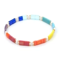 Bohemian Tila glass bead bracelet featuring vibrant rainbow colors and golden spacers - Multicolor Patchwork
