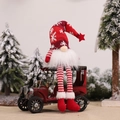 Gnome plush in red snowflake hat sitting on a vintage red car Christmas decoration - Red Long Legged Doll With Light (E-DD05)