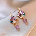 Detailed close-up of purple butterfly earrings with pearls and gemstones on silk - 17# Silver Needle - Purple