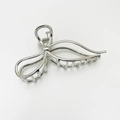 Close-up of minimalist silver butterfly metal hair claw clip with a polished finish - No.20 Silver Large Bow