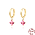 Macro view of S925 sterling silver four-leaf clover earrings with pink zircon inlays - 925 Silver / Gold - Rose Red