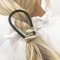 Black elastic hair tie with gold geometric metal charm on a creative display background - 5# Irregular Loop Style