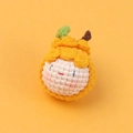 Handmade knitted orange pumpkin charm with a smiley face made of soft woolen yarn - MENGSI Ugly Tangerine Dumpling