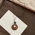 Retro ethnic style necklace with wooden flower pendant and tassel on vintage calligraphy background - 5# Necklace - Black & Green (Zen Style)