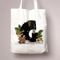 Witte kerst canvas tas met een decoratieve letter G en feestelijk rendier ontwerp erop - Letter G