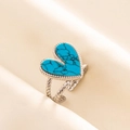 Close-up of a silver-tone ring with a heart-shaped turquoise stone and rope band - Silver Tone-Blue Turquoise Look (J549-S-DB)