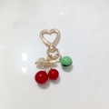 Red cherry keychain with gold leaves, green bell and heart-shaped clasp accessory - Red Cherry with Green Bell and Heart Buckle (Cherry L)