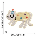 Cute white cat embroidery patch with blue party hat and colorful polka dots motif - Polka Dot Cat with Blue Party Hat