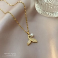 Elegant mermaid tail necklace with white pearl and sparkling crystals on silk background - Mermaid Tail Style (J417)