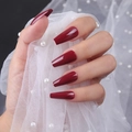 Close-up of glossy wine red ballerina nails held with white pearl lace fabric - Wine Red (ZBLL-10)