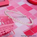 Elegant white headband featuring a row of 8mm round pearls on a comfortable slim band - Single Row Large Pearl Style (8mm)