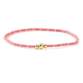 Pink cylinder ceramic beads bracelet with gold spacer spheres on white background - Rose Pink