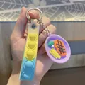 Porte-clés anti-stress en silicone avec plateau violet et modèles de nourriture miniature - Simulation Steak Grillé