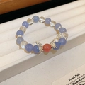 Detail of freshwater pearl bracelet with blue beads and silver butterfly charm - Blue-Butterfly-Bow