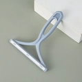 Manual pet hair remover with ergonomic blue handle and white double-sided shaver head - Light Blue