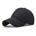 Detailed close-up showing the breathable fabric texture and six-panel structure of the cap - Adjustable / Black