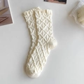 Close-up of beige JK mid-calf socks featuring a 3D knit texture and elastic cuffs - Bubble Lace