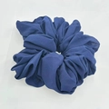 Detail view of a large navy blue chiffon hair scrunchie with soft ruffled texture on white - Dark Blue (2-4)