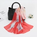 Red to pink gradient chiffon scarf with white feather print tied to a black handbag - Bright Red (XQ366)