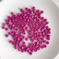 Close-up of vibrant purple cylindrical acrylic tube beads for DIY jewelry making - 12# Rose Red