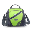 Detail of the multi-functional outdoor bag with reinforced handle and reflective safety strip - Green