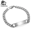 Close-up of polished silver titanium steel cuban chain bracelet with engravable blank bar - Men's Bracelet (Steel)