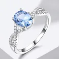 Classic 925 sterling silver ring with oval light blue gemstone and twisted diamond band - Size 5 / Oval Intertwined Style (RUJ099B-1) / Light Blue
