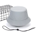 Detail view of grey quick-dry bucket hat with adjustable black windproof chin strap - Smoke