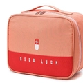 Portable orange medical kit bag with Good Luck print and white medical icon - Pink