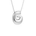 Macro shot of polished silver G letter bubble pendant with stainless steel chain - Silver G