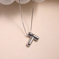 Polished silver bubble letter T pendant necklace with a mirror-finish copper design - Letter T - Silver