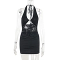 Detail von schwarzem Neckholder-Kleid mit transparentem Spitze-Patchwork-Design - S / Schwarz