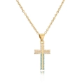 Golden cross necklace with inlaid white zirconia and turquoise stones on a white background - Gold Turquoise White Zircon Style