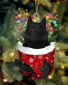 Weihnachtsschmuck mit schwarzem Hund in roter Socke und Rentiergeweih für den Baum - Schwarzer Hund Typ 10