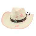 Detail of pink star patterns on a straw cowboy hat with a brown leather studded band - Pink with Wind Rope (Blue Star)