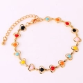 Detail of gold heart chain bracelet with colorful enamel links and lobster clasp - 18K Gold / Multicolor Bracelet 3