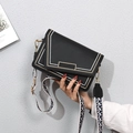 Black PU leather crossbody bag with geometric lines and a wide patterned shoulder strap - 21*9*14 / Black