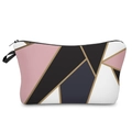 Detail view of marble print makeup bag showing geometric color blocks and gold lines - Colorful Geometric Blocks