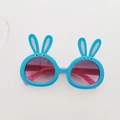 Cute bunny-shaped kids sunglasses in bright blue and pink frame with gradient lenses - Blue