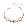 Bracelet coeur en or rose avec pierres vertes et pierres de zircone scintillantes - Trois Cœurs Creux / Or Rose/Pierre Précieuse Verte